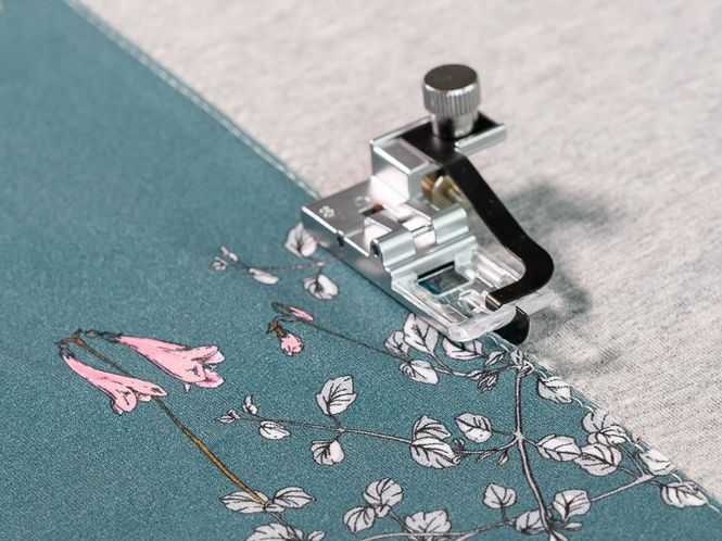 Hovedbilde Janome/Elna Senterguidefot (Coverstitch)